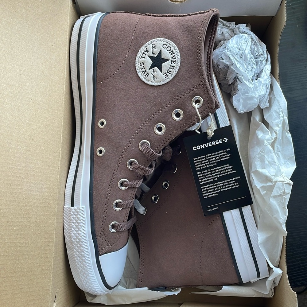 NWT Brown Converse. Men’s 9. Women’s 11. Brand new. Never worn.
